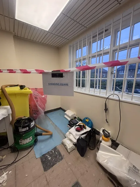 Asbestos floor tile and bitumen removal in Penge